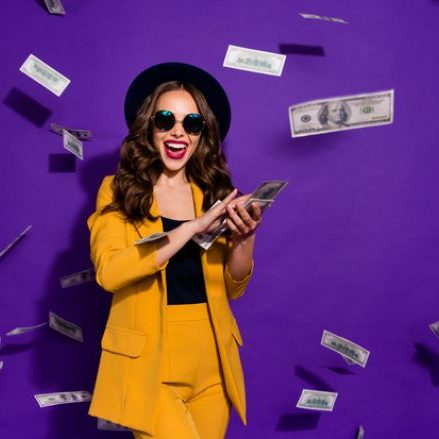 woman-throwing-money-770x439_c